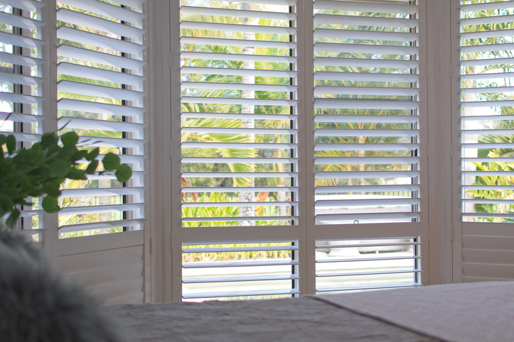 Sample wood shutters in bedroom