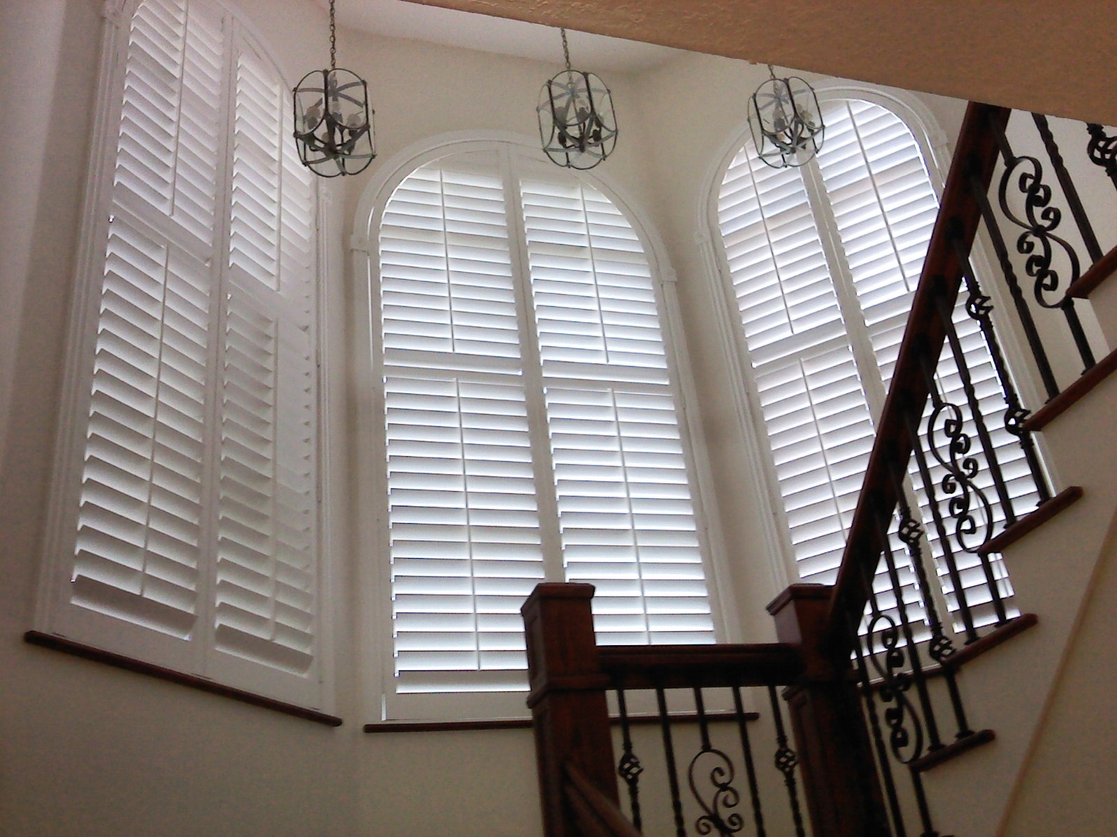 Shutter example that has a arch type shape