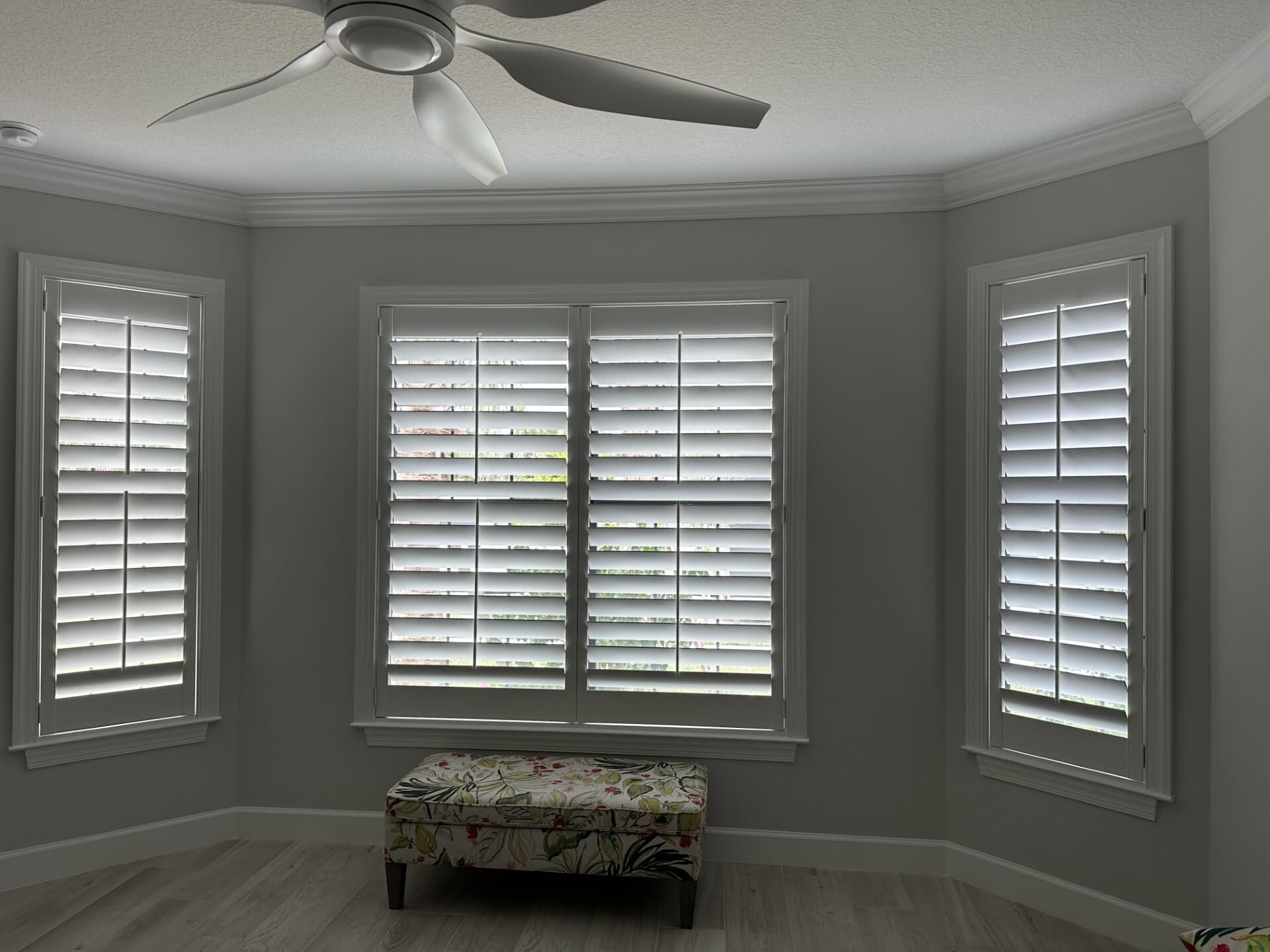 Plantation shutters in a Palm Beach County master suite
