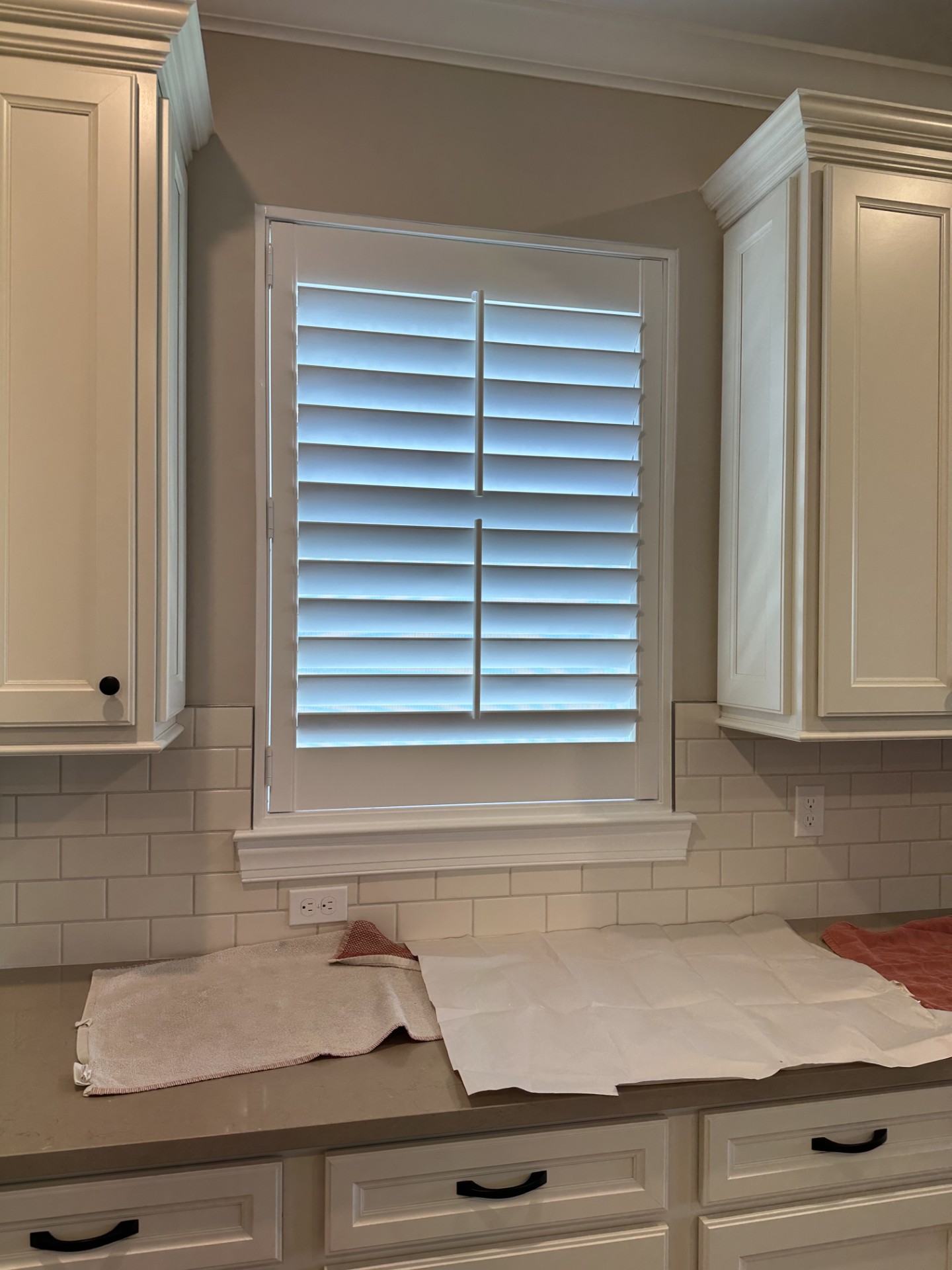 Actual APS basswood plantation shutter with fitted frame and split tilt