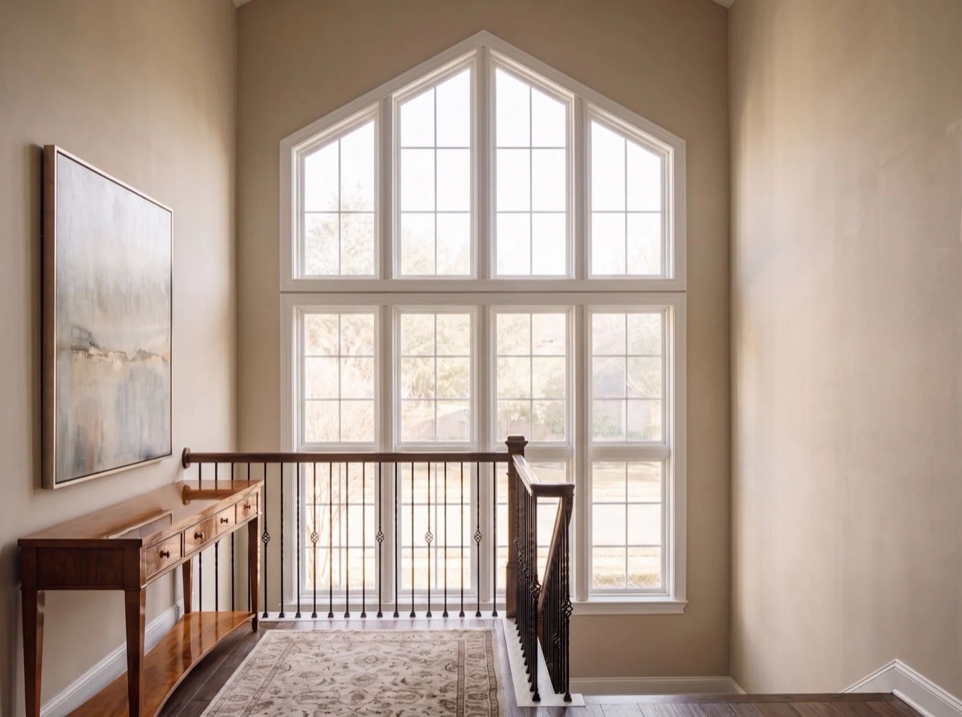 Stairwell Landing before custom plantation shutters by Architectural Plantation Shutters