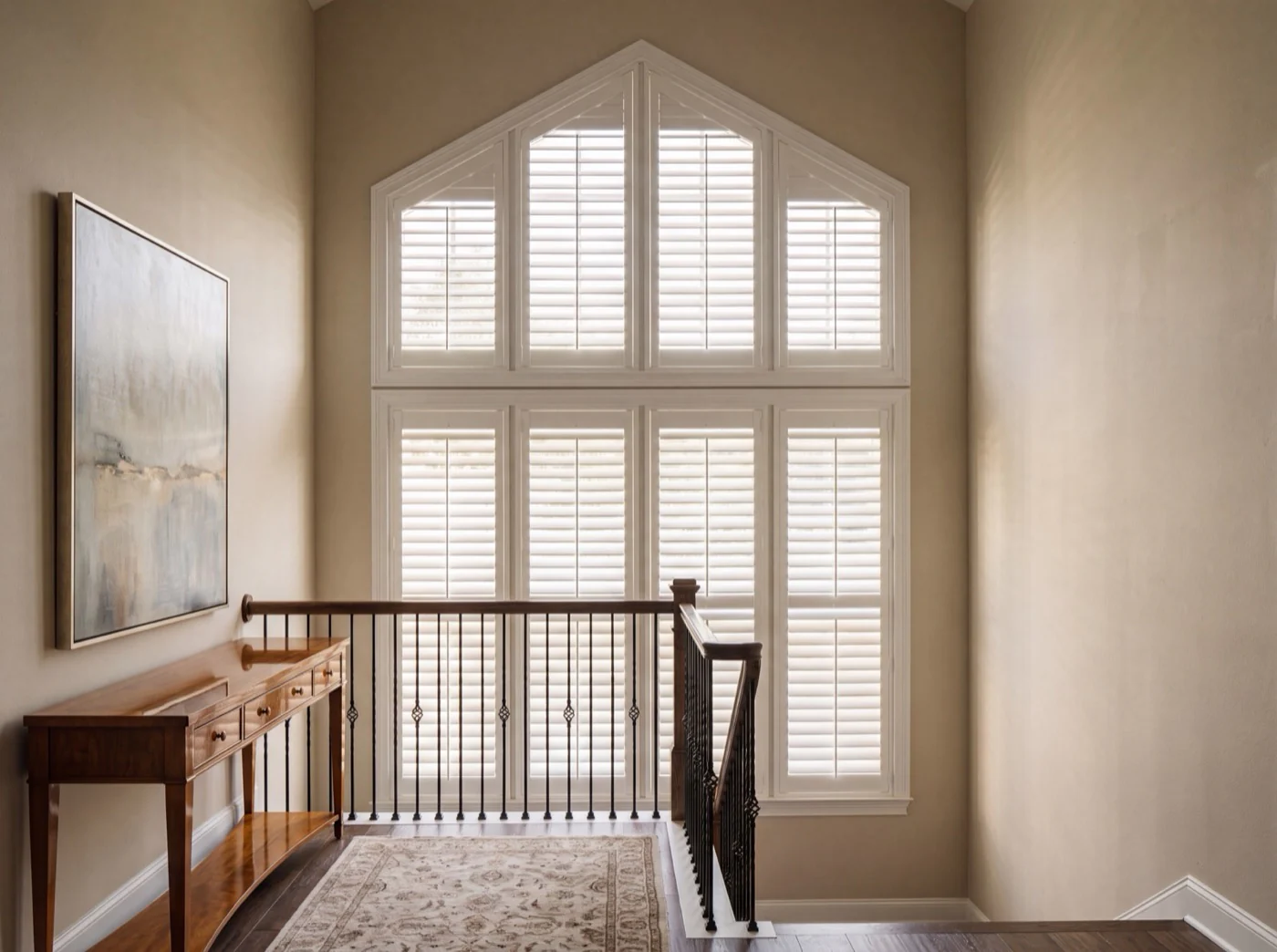 Custom plantation shutters fitted to tall angled windows