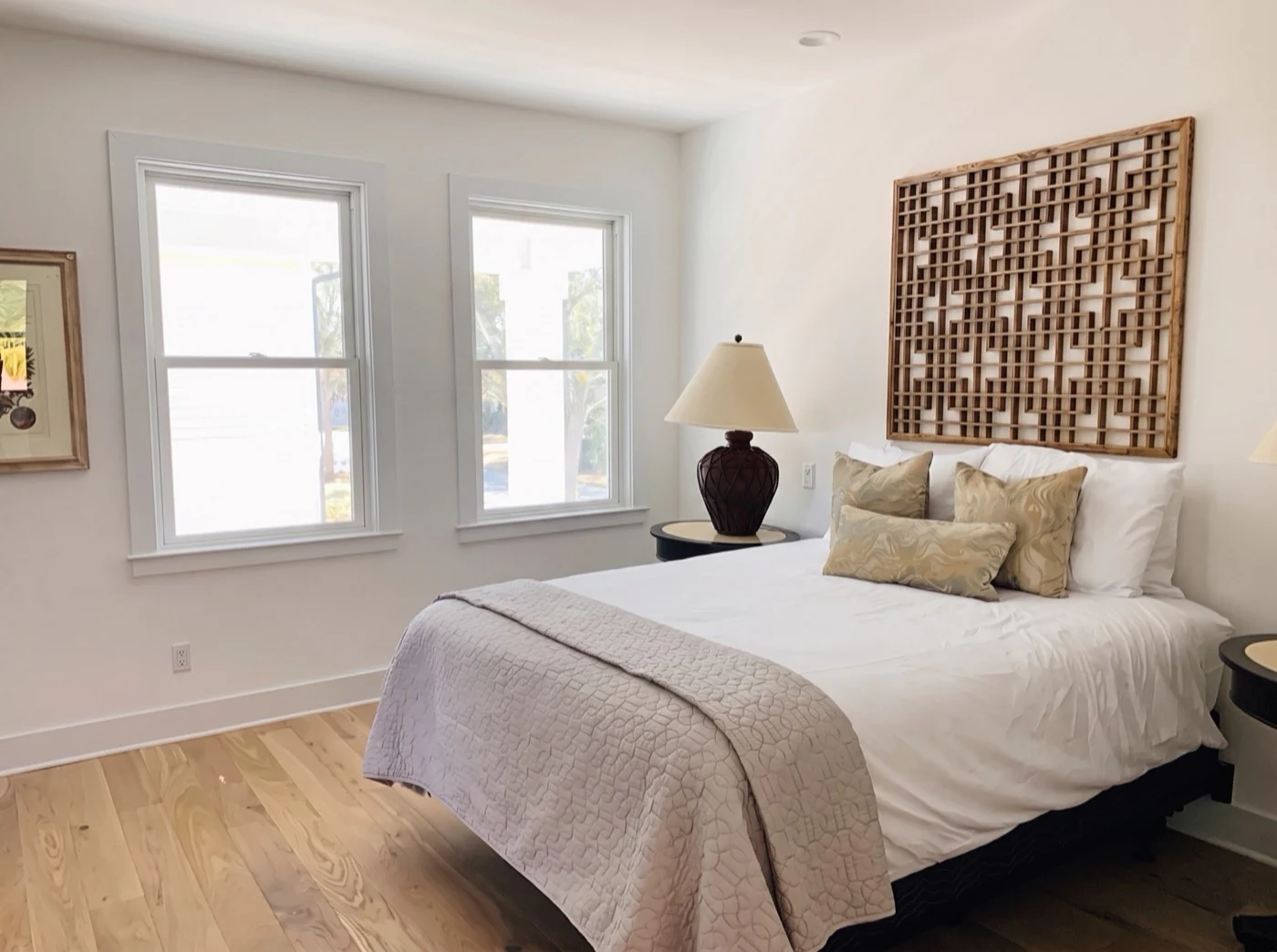Living Room before custom plantation shutters by Architectural Plantation Shutters