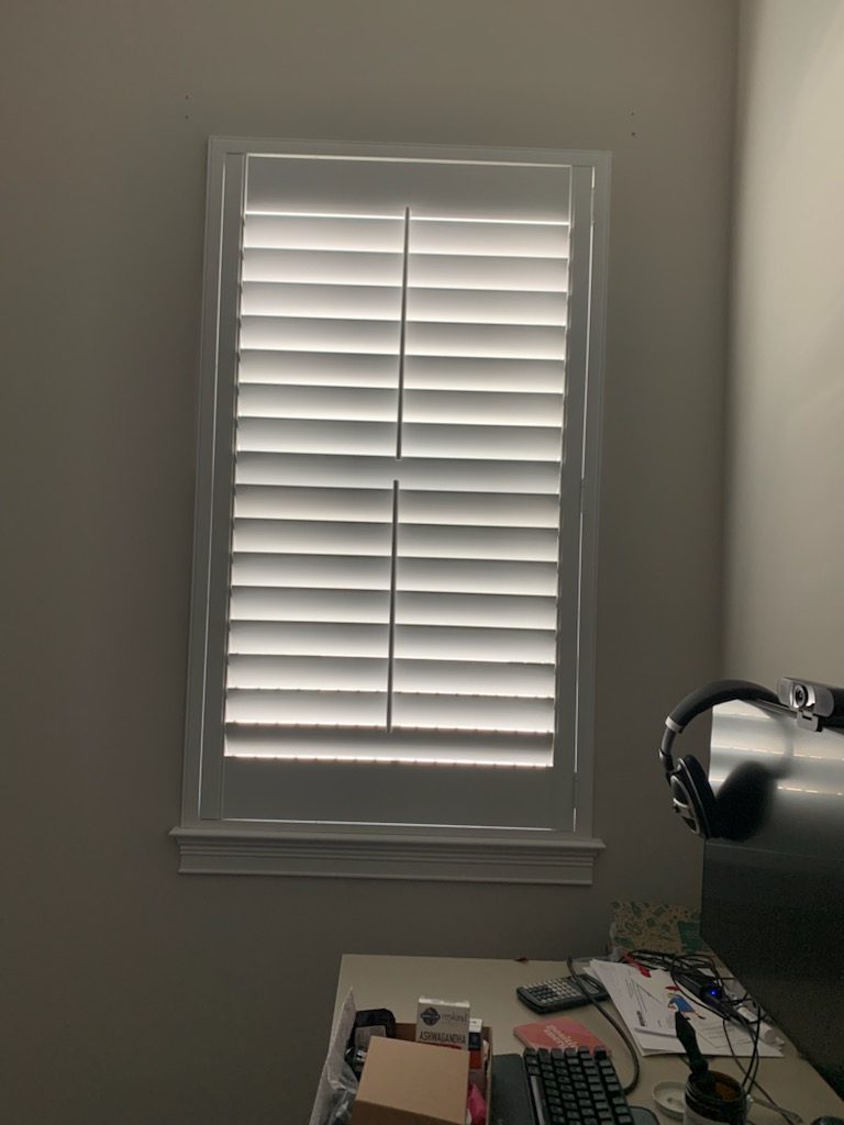 Two-panel plantation shutter on an office window, Highpointe, Stuart, FL