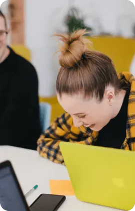 Woman laughing in an office