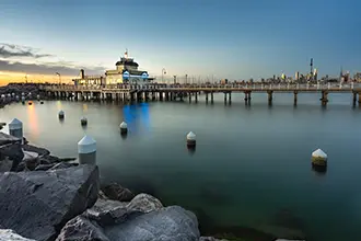 a view of st kilda pier showcasing it's beachside location