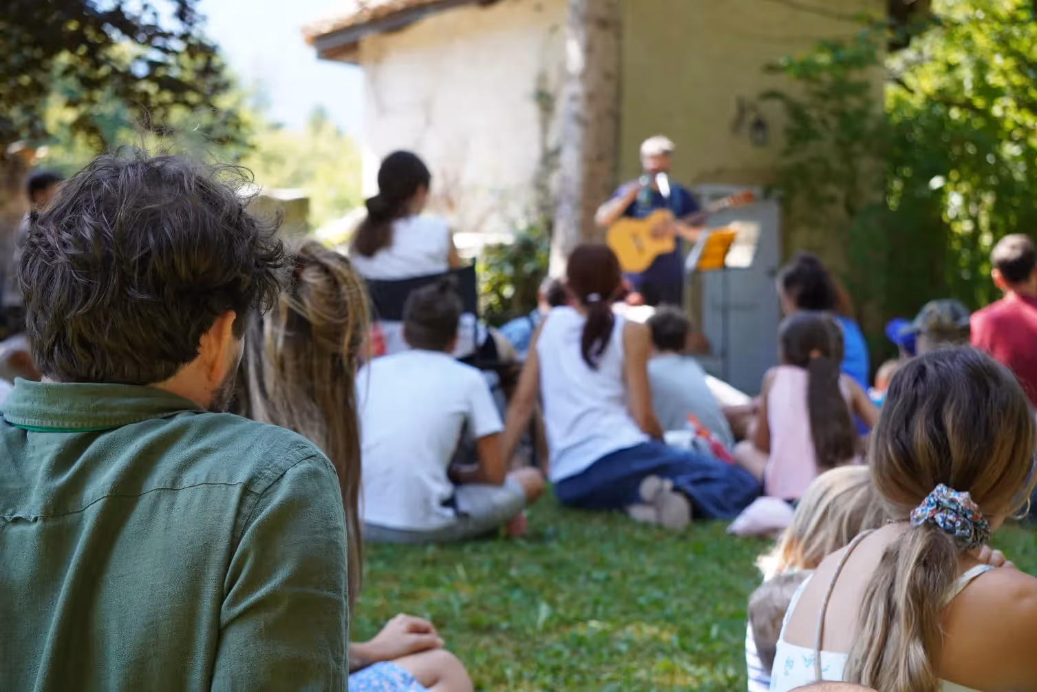 people watching amphitheater stage stock image