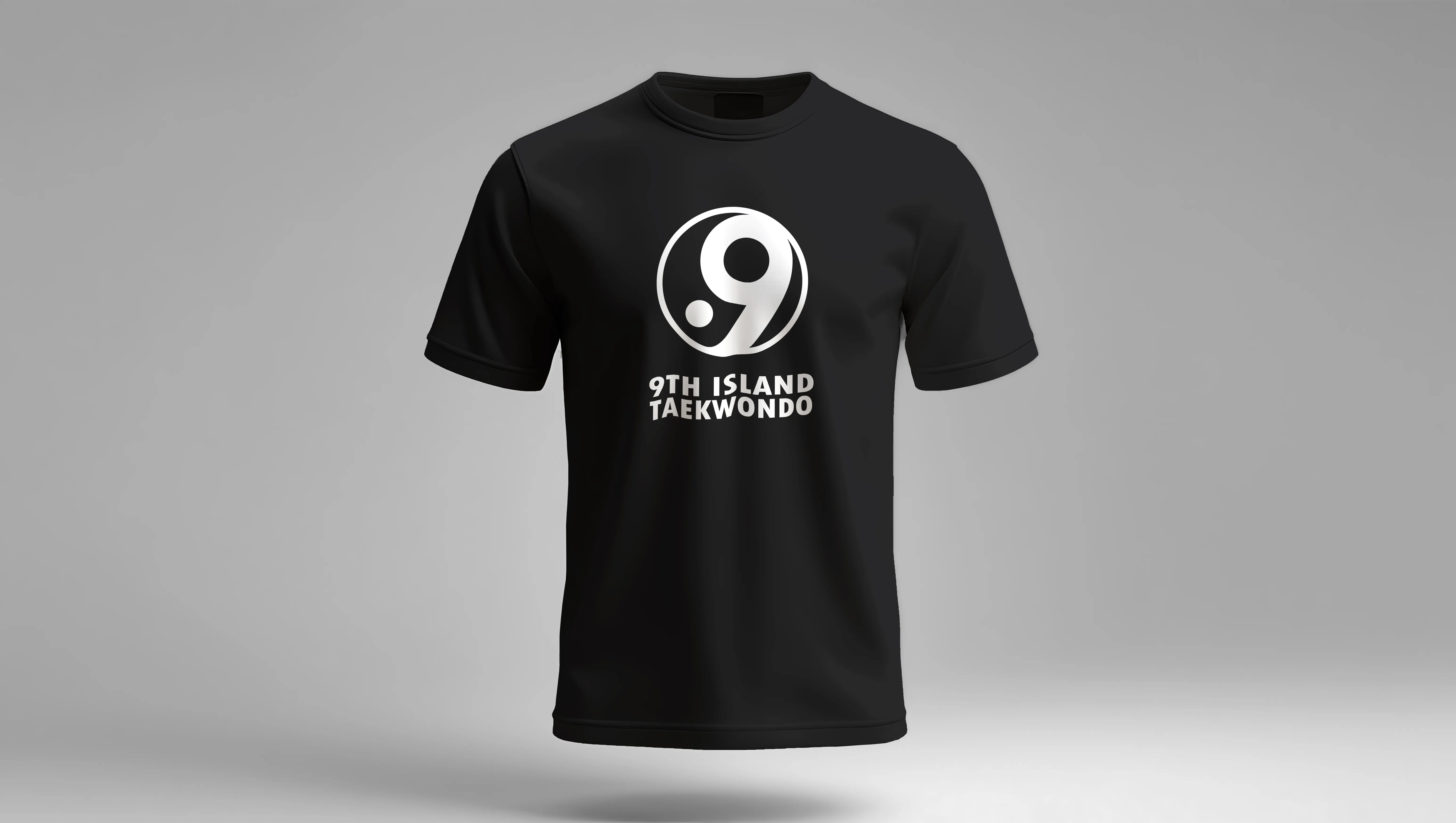 Black T-shirt with a white circular logo featuring the number 9 and text reading '9th Island Taekwondo' on the front.
