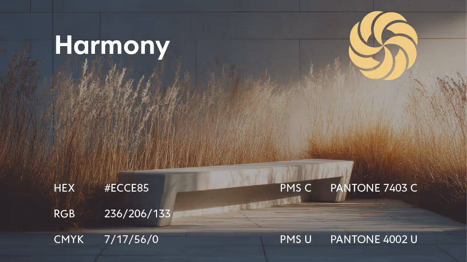 Warm neutral palette titled “Harmony” featuring a concrete bench surrounded by sunlit dry grasses. HEX #ECCE85, RGB 236/206/133, Pantone 7403 C / 4002 U.