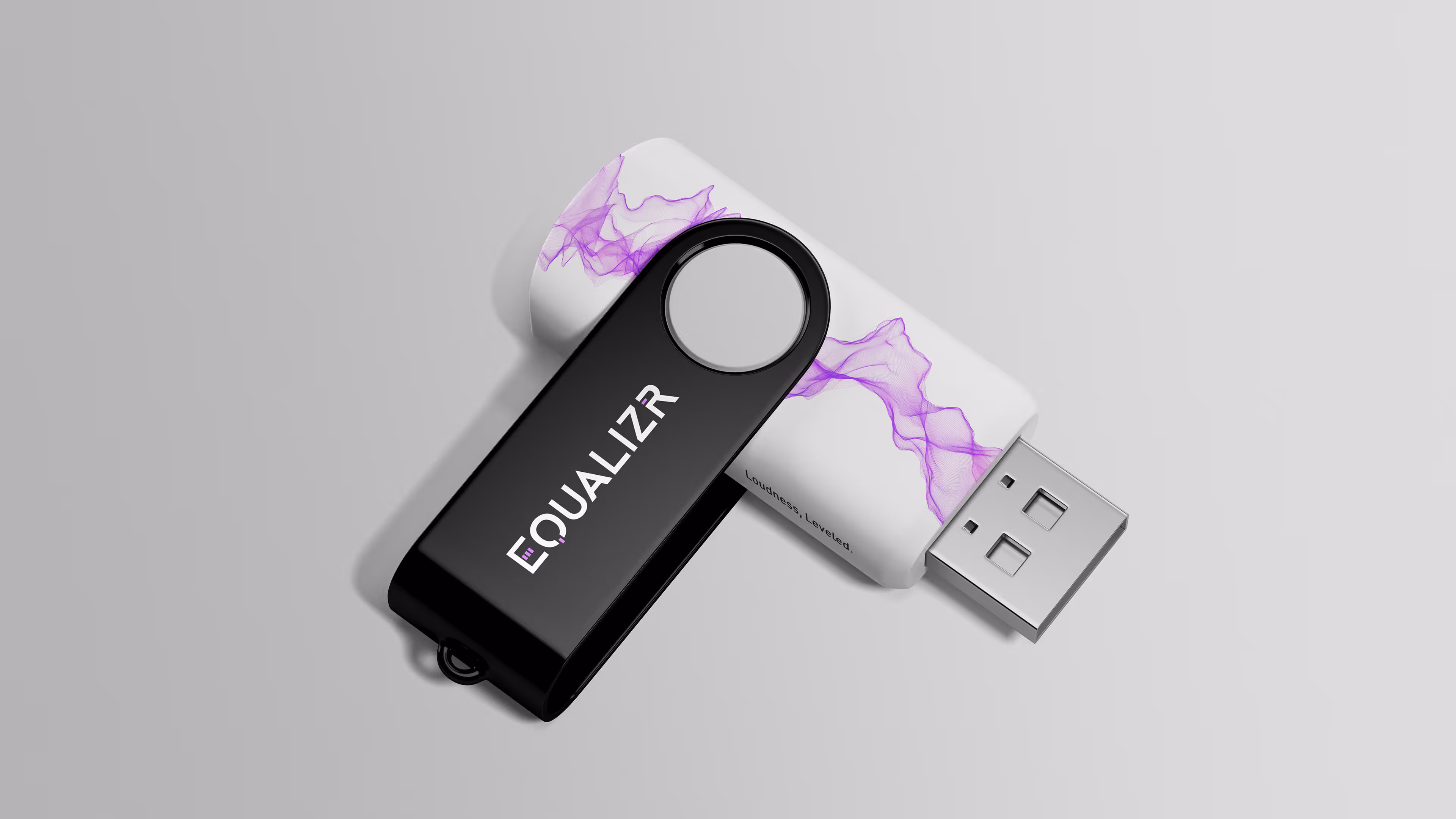 Black USB flash drive with the EQUALIZR logo resting on a white USB case that features a purple wave graphic.
