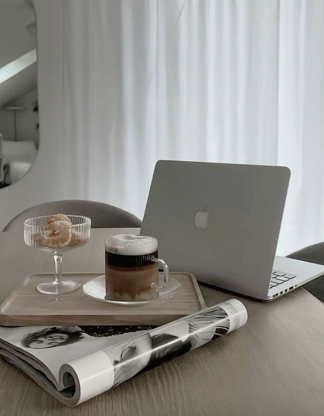 a laptop on table with coffee