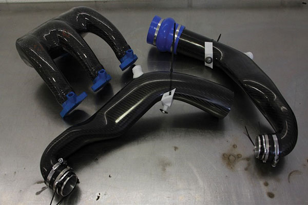 Array of composite ducts made with FDM soluble cores