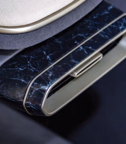 Close-up of 3D printed air conditioning diffusor with marble effect.
