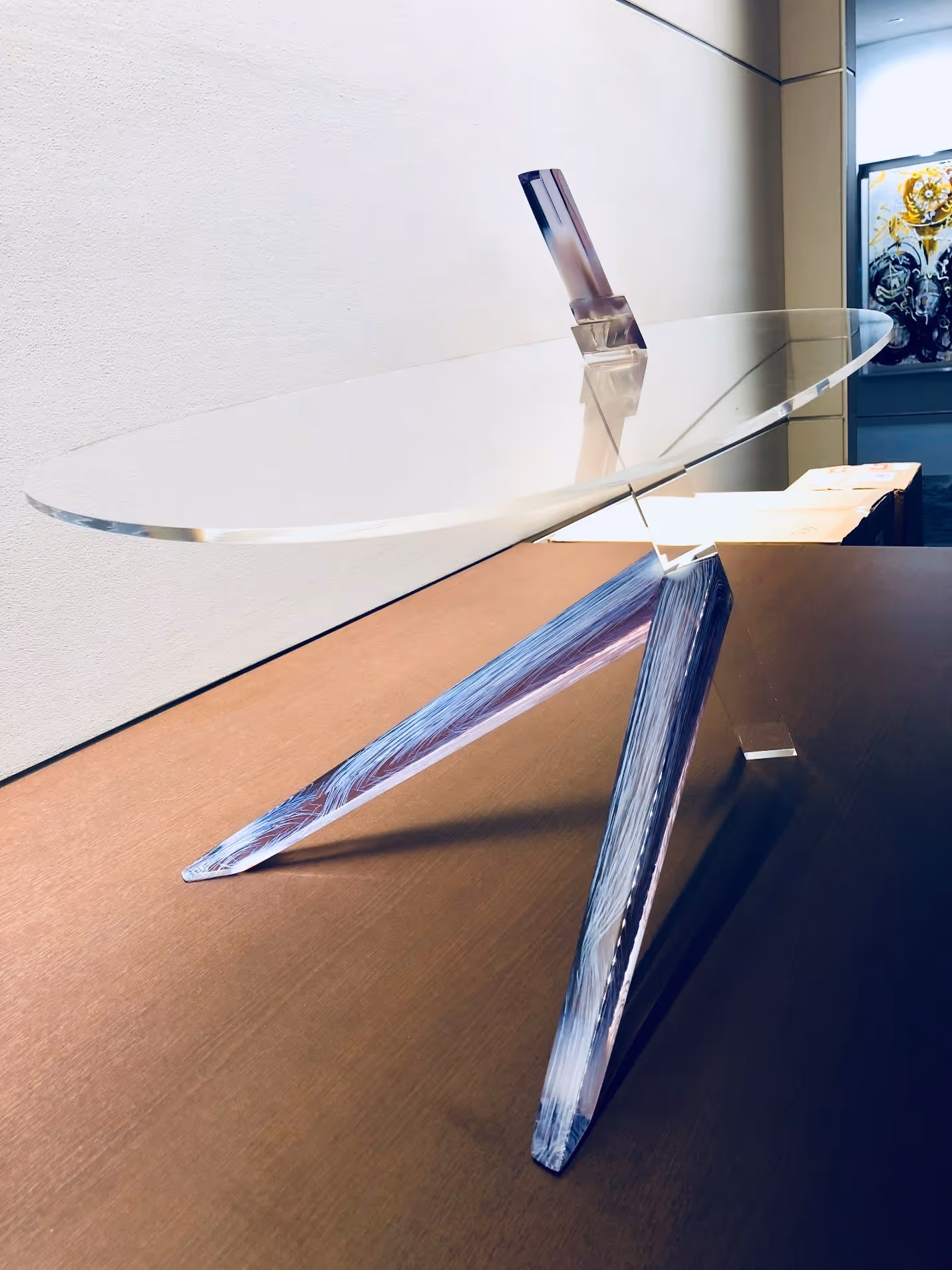 Transparent legs of a table whose design was inspired by wood grain, and was 3D printed using GrabCAD Voxel Print on the Stratasys J750 full color, multi-material 3D Printer by the Singapore University of Technology and Design (SUTD).