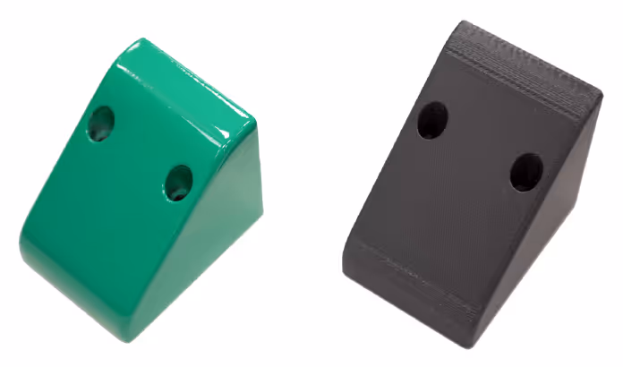 Strong, yet lightweight 3D printed protective casing used on robotic packaging machines. Produced with the Stratasys Fortus 450mc in FDM Nylon 12CF material and finished with green varnish.