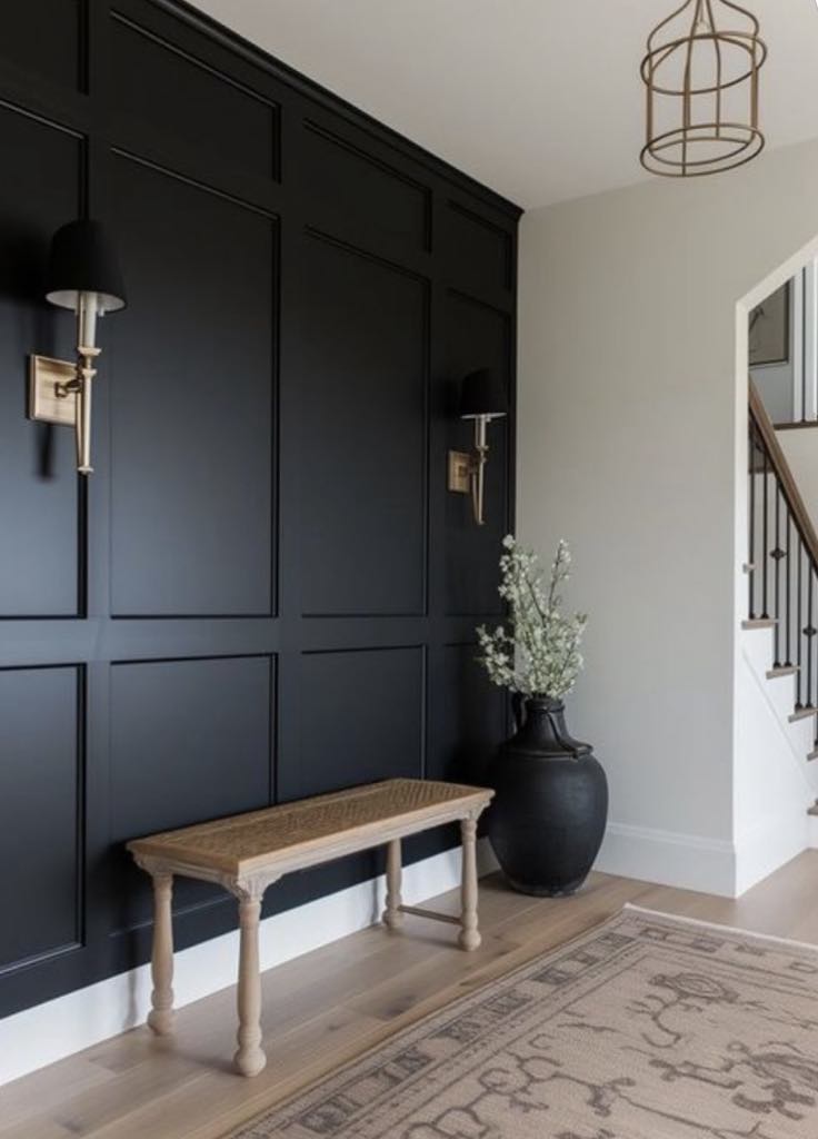 high fabric black chairs around a white kitchen counter island in a nice home. 