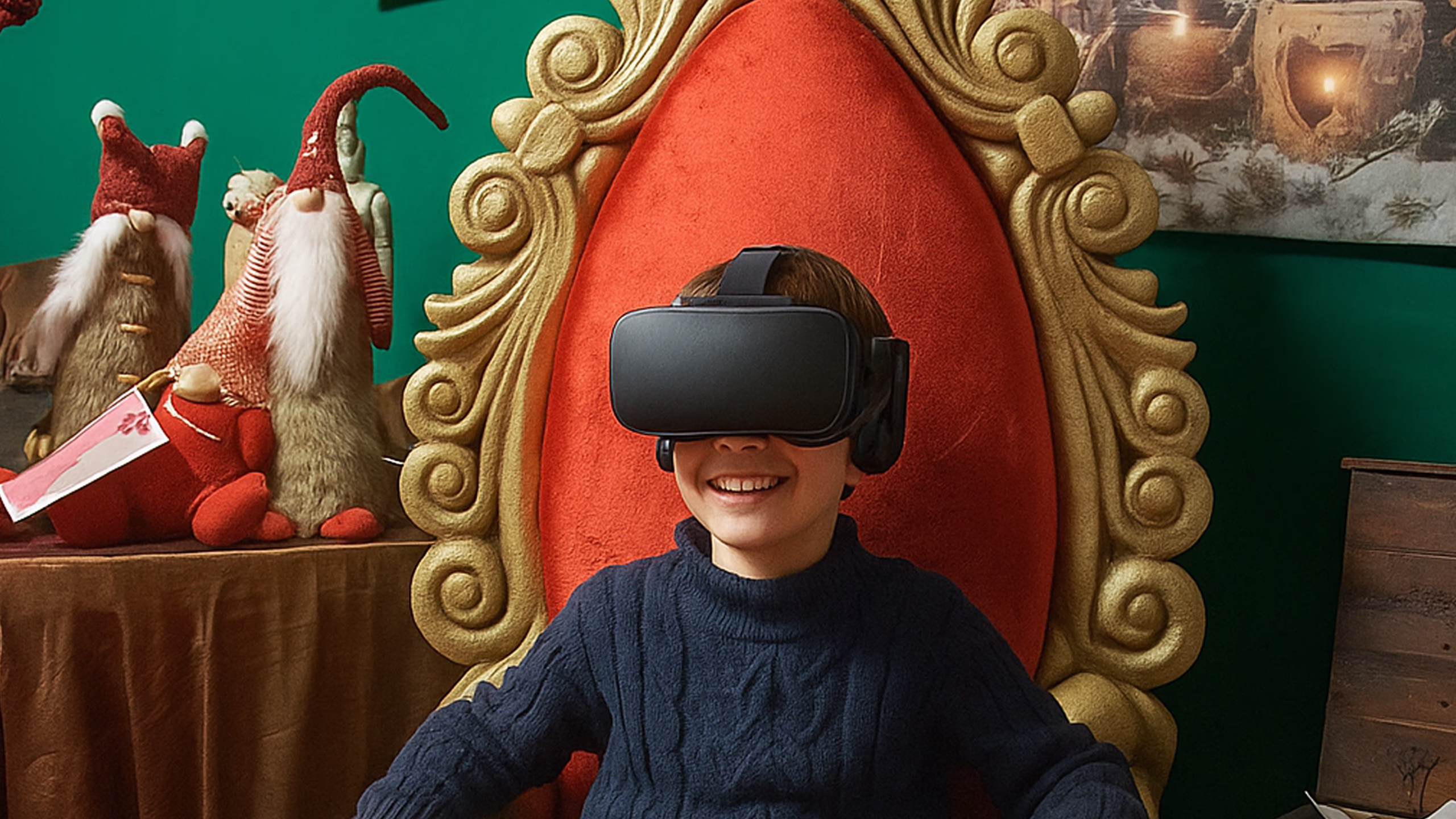 Interactive Christmas installation with VR viewer and golden baroque scenographic throne, creating immersive multimedia experience for children during Christmas events.
