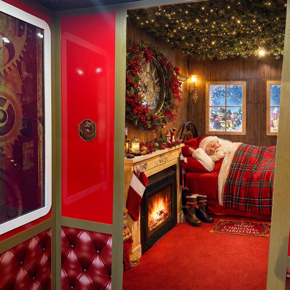 Santa Claus sleeping in a room decorated with a burning fireplace, garland and Christmas lights.