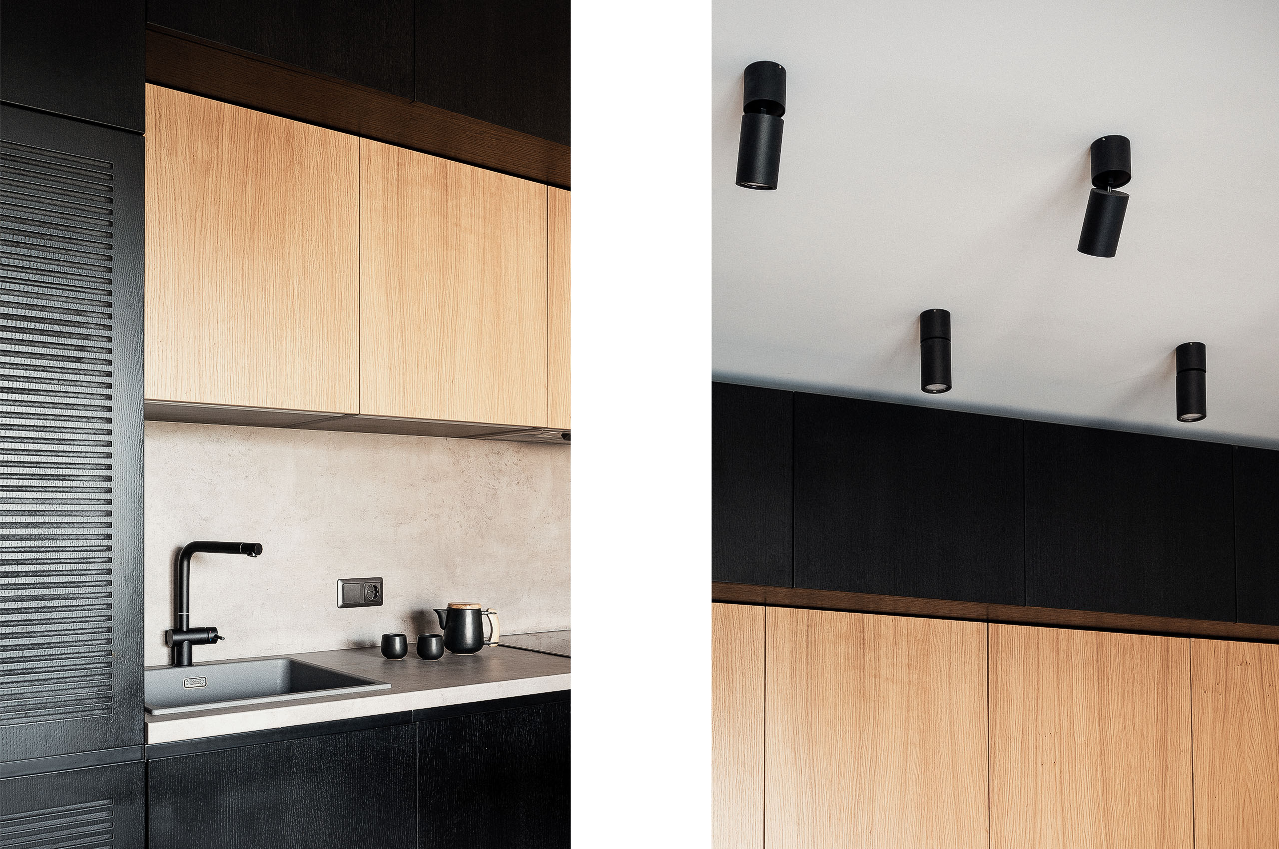 Nahaufnahme von oberen Küchenschränken aus Eiche und schwarzen Deckenstrahlern in einem modernen Innenraum.