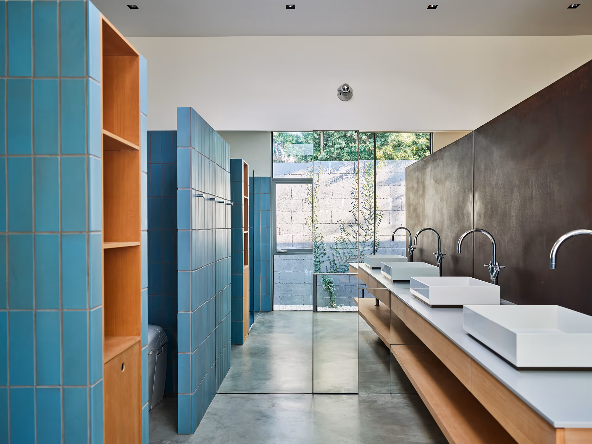 primary bathroom with custom vanity and storage