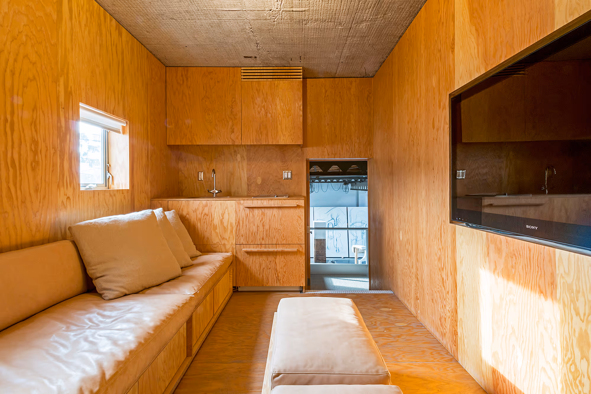 media room with built-in sofa