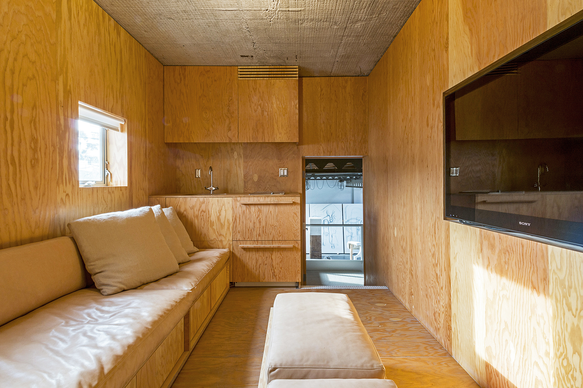 media room with built-in sofa