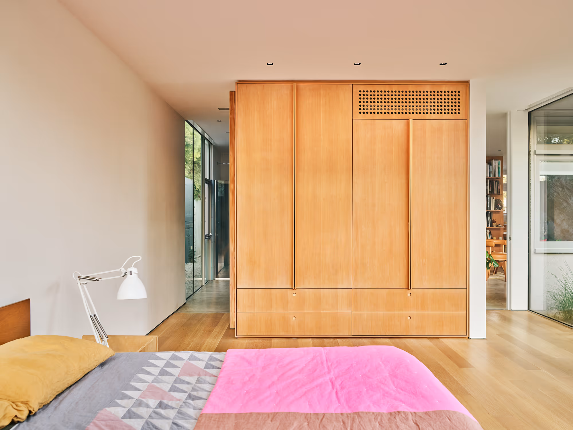 detail of bedroom with custom storage