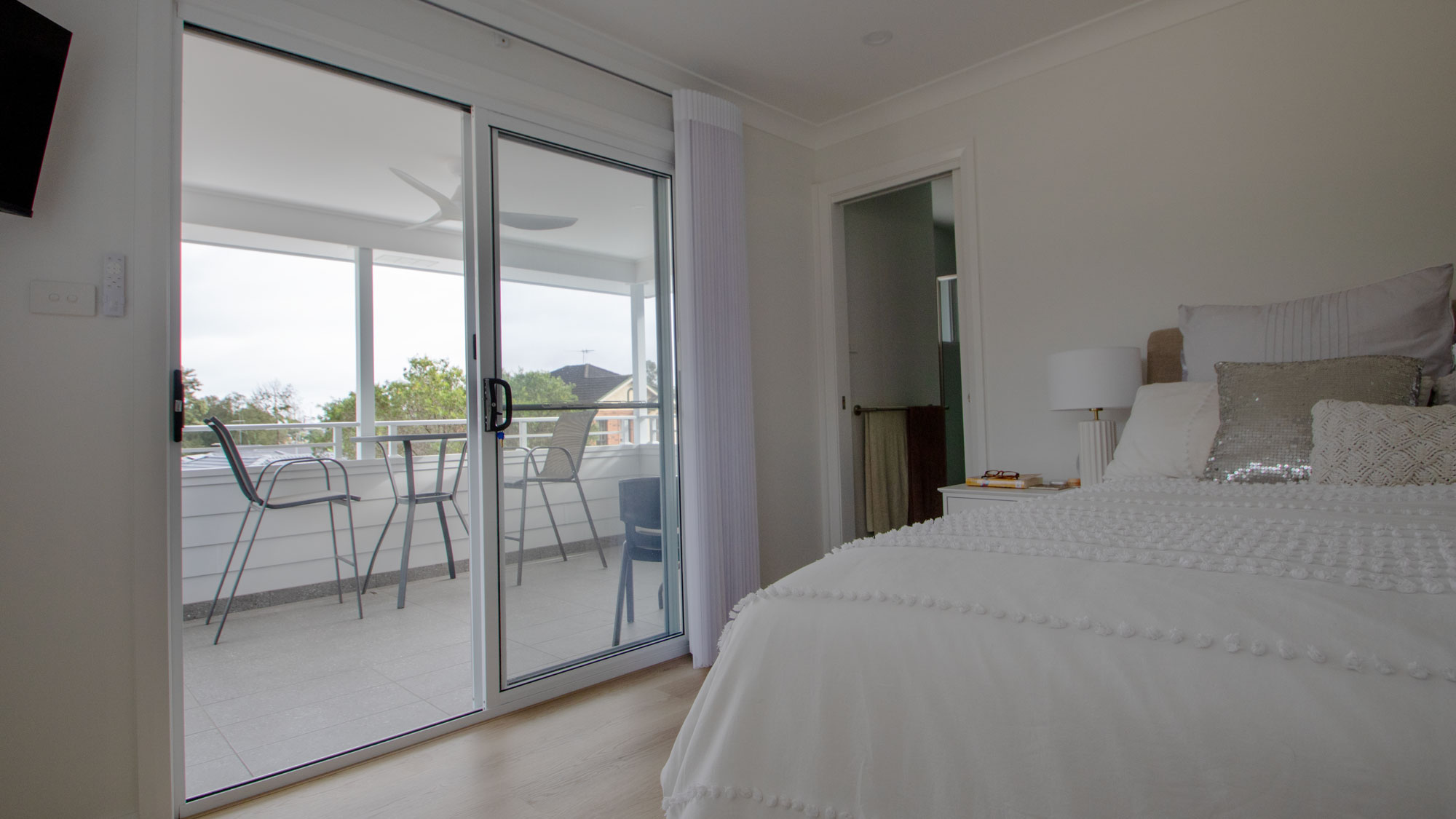 master bedroom with private encolsed balcony, ensuite and walk-in robe