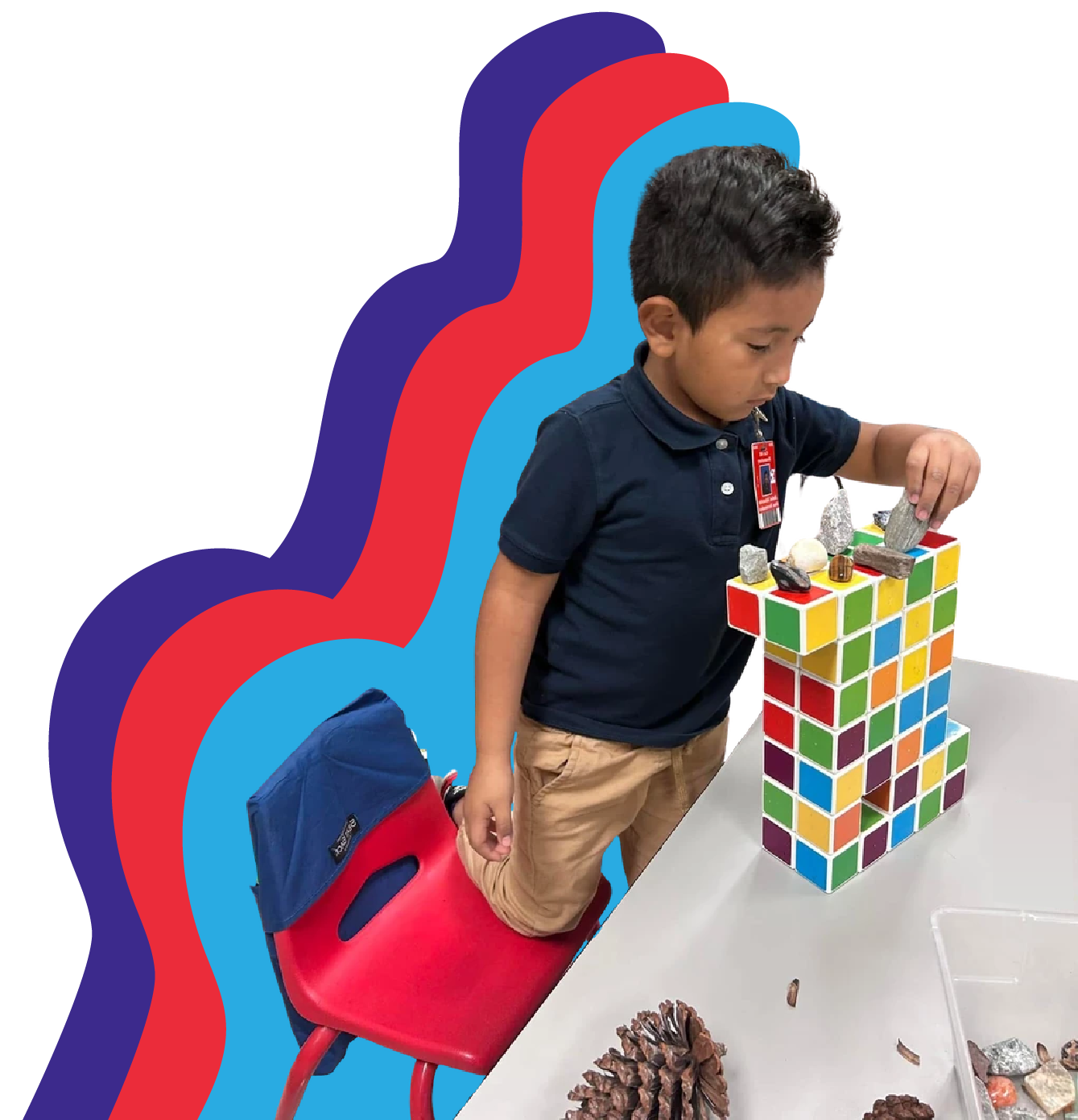 Male child playing with building blocks