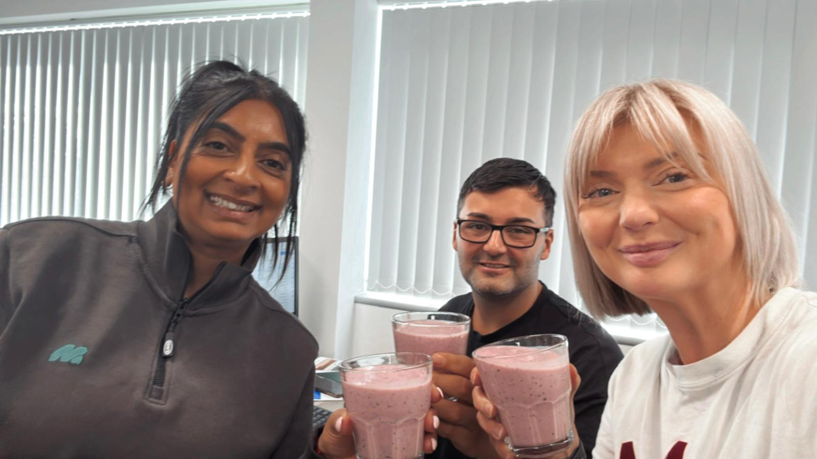 Micom's commercial team drinking smoothies in Coventry