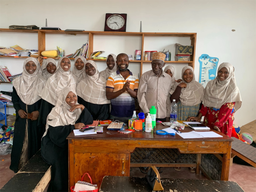 A group of people posing for a photoAI-generated content may be incorrect.