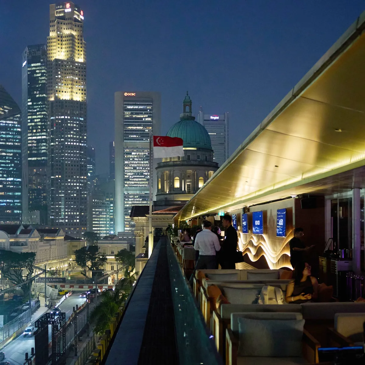 HOKO rooftop hospitality overlooking the Singapore skyline and race circuit at night