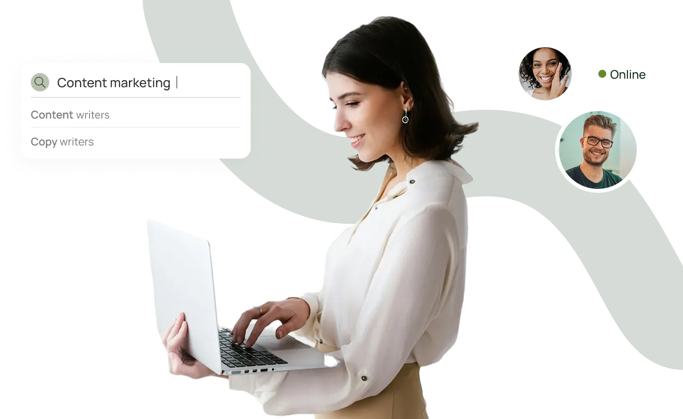 A woman holding a laptop computer in her hands.