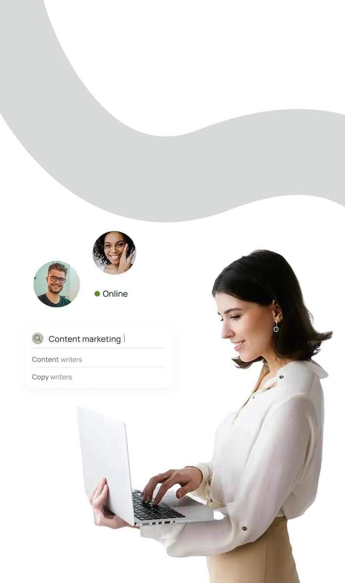 A woman holding a laptop computer in her hands.