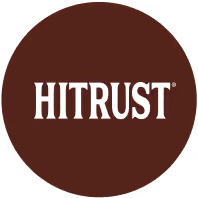The image shows the HITRUST logo. The word "HITRUST" is written in white, sans-serif font on a dark brown circular background. The registered trademark symbol is visible to the right of the word.
