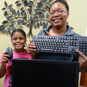 school teach and student received newly donated computers Nonprofit Electronic Recycling Center Atlanta Ga