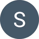 Circle with dark gray background and a white letter S centered inside.