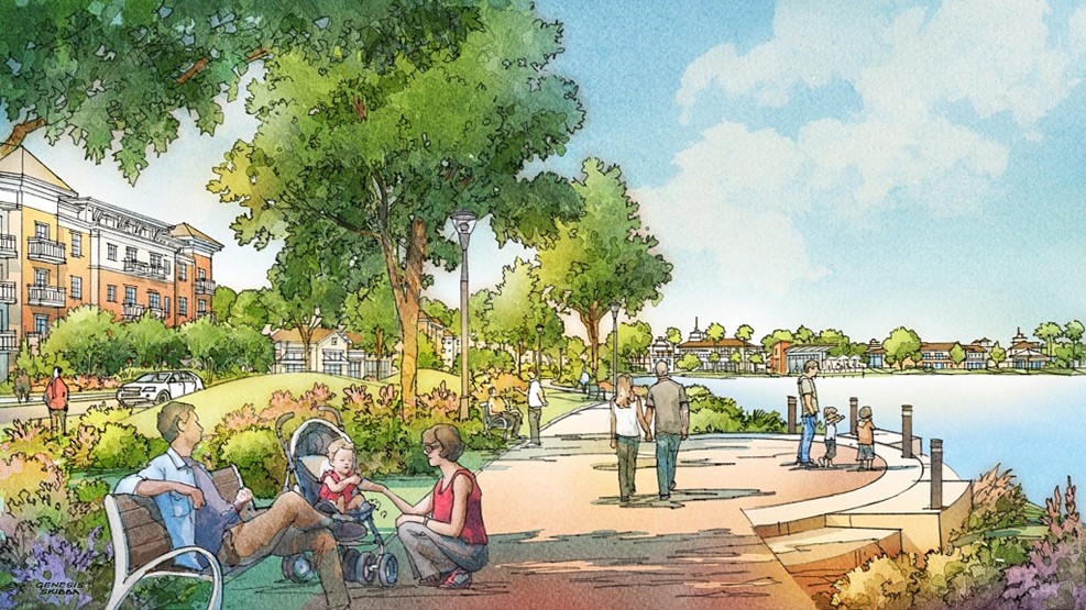 Waterfront park with people relaxing, walking, and enjoying scenic landscape
