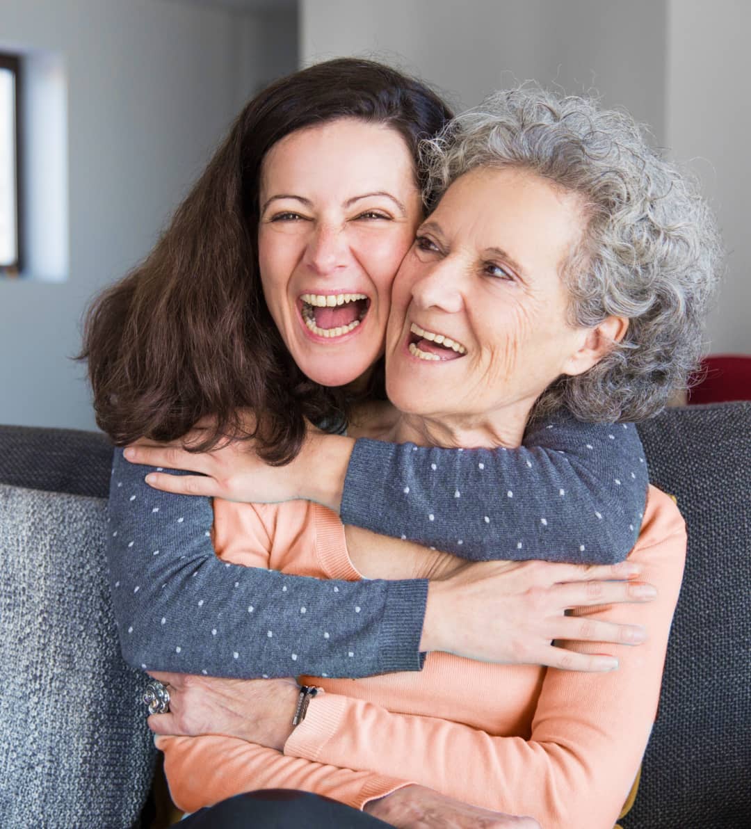 Daughter And Mother Happy Hug - ElderlyCare X Webflow Template