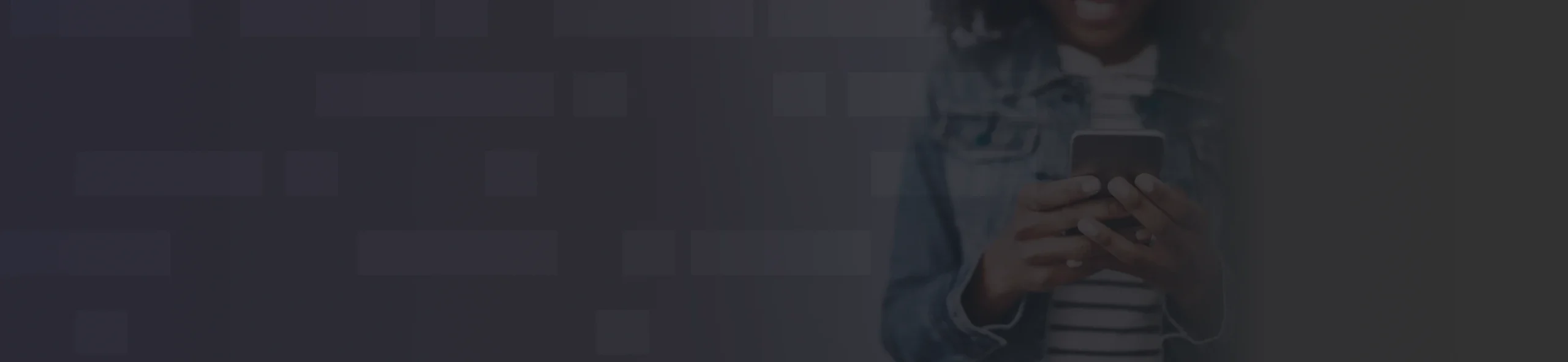 An image showing a woman on her phone.