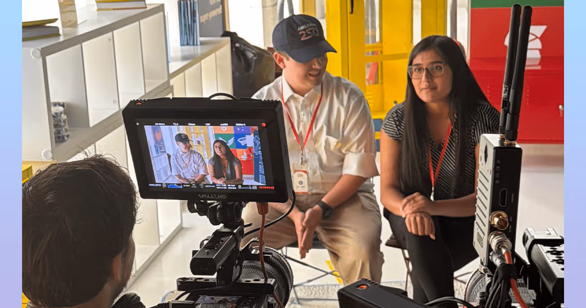 UA Little Rock students Zane Austin and Nistha Neupane sit for a television interview after earning funding and national recognition through America250’s “America’s Startup” competitive pitch event for their nanotechnology startup, NanoLit. Submitted photo