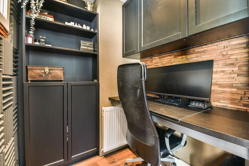 interior of home office with darker cabinets