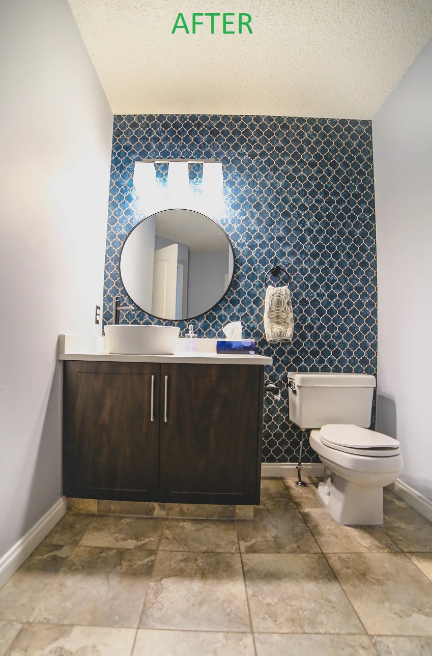 newly renovated marble bathroom counter and cabinets