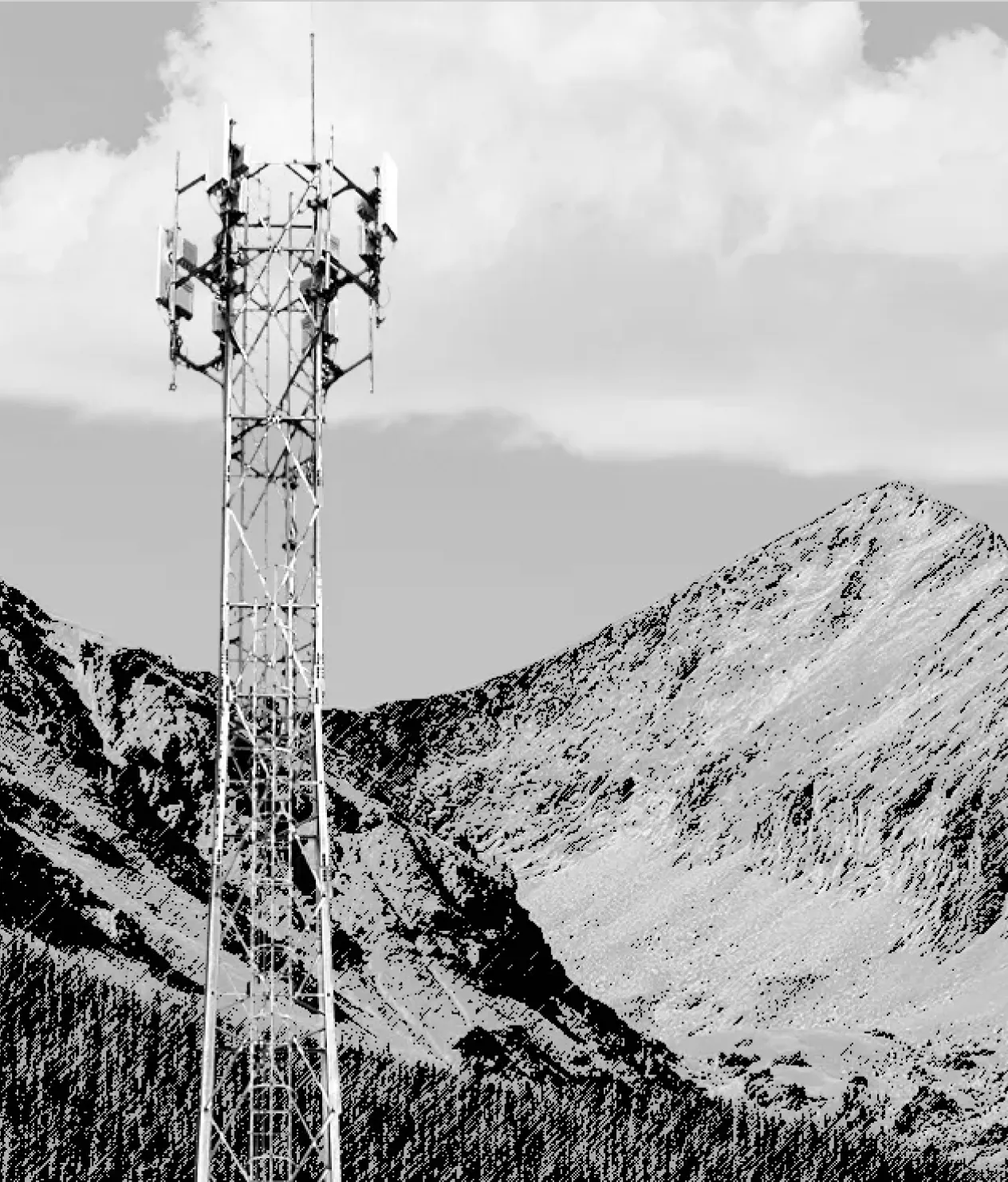 This is a stark, high-contrast black and white photograph that juxtaposes modern technology with a rugged natural landscape. On the left, a tall, steel lattice telecommunications tower rises, its complex array of antennas clearly visible at the top. In the background, a large, majestic mountain slope, partially covered with snow, dominates the frame. Below the snowline, a dense forest covers the base of the mountain. The high-contrast rendering gives the image a graphic quality, emphasizing the sharp textures of the rock and the stark white of the snow and the tower against the dark forest and sky.