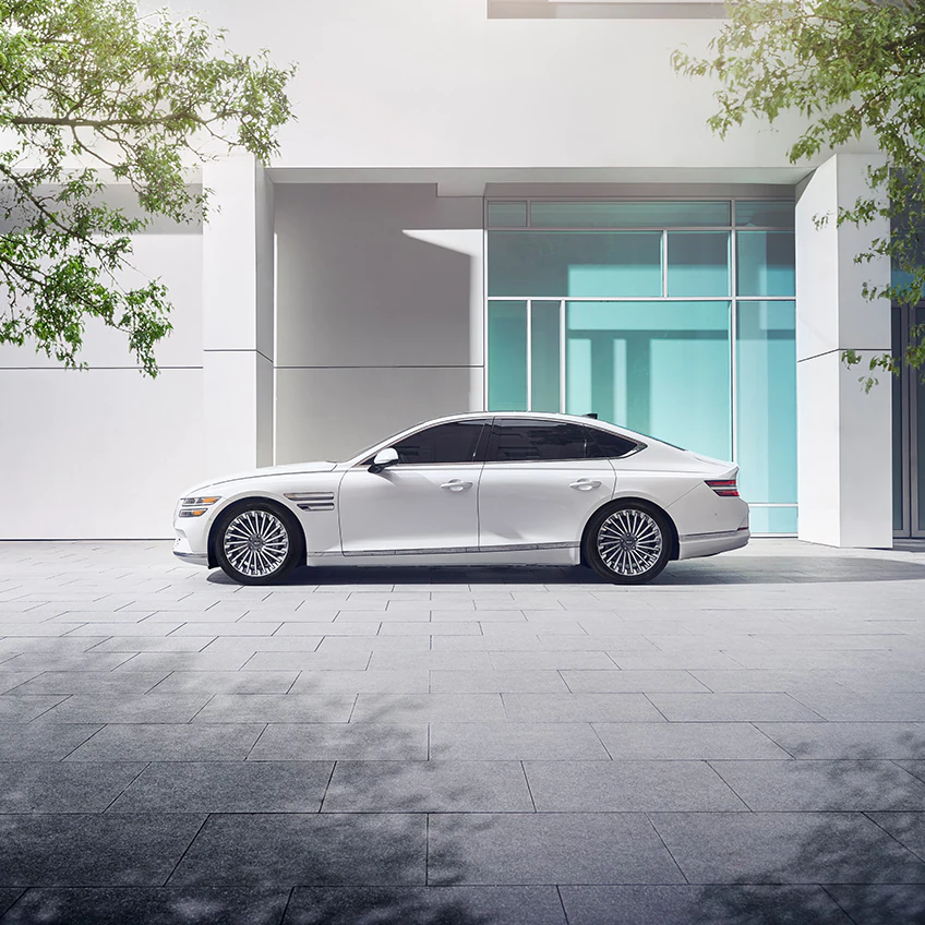 Side profile of white Electrified G80