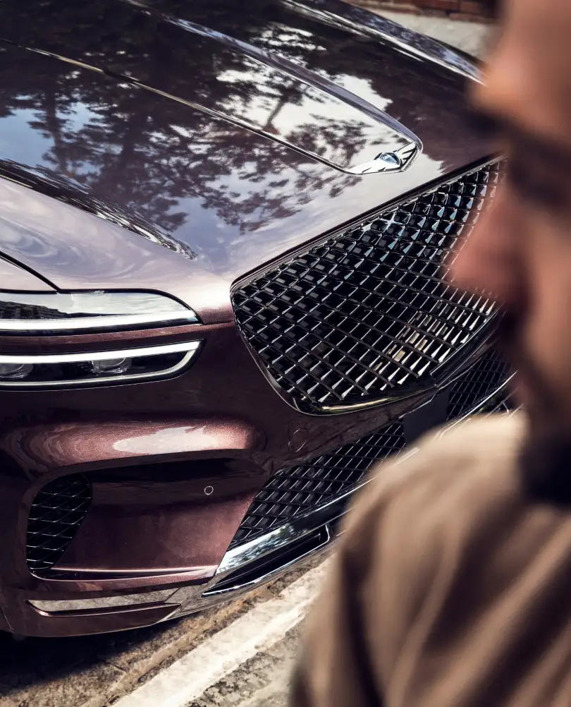 Man admiring GV70