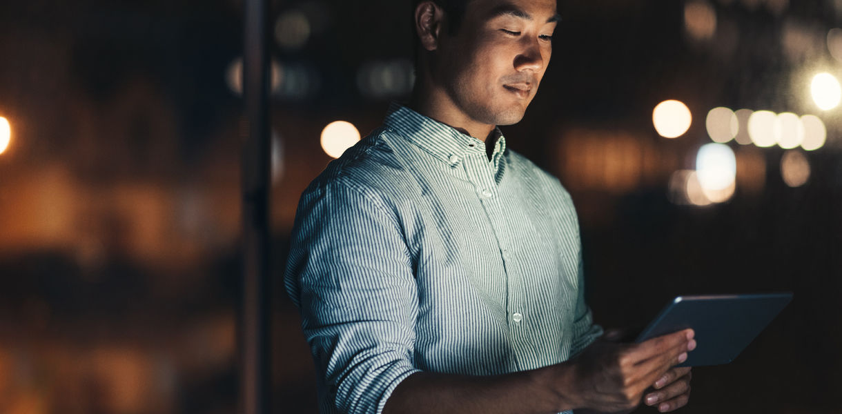 Genesis Connected Services owner with tablet