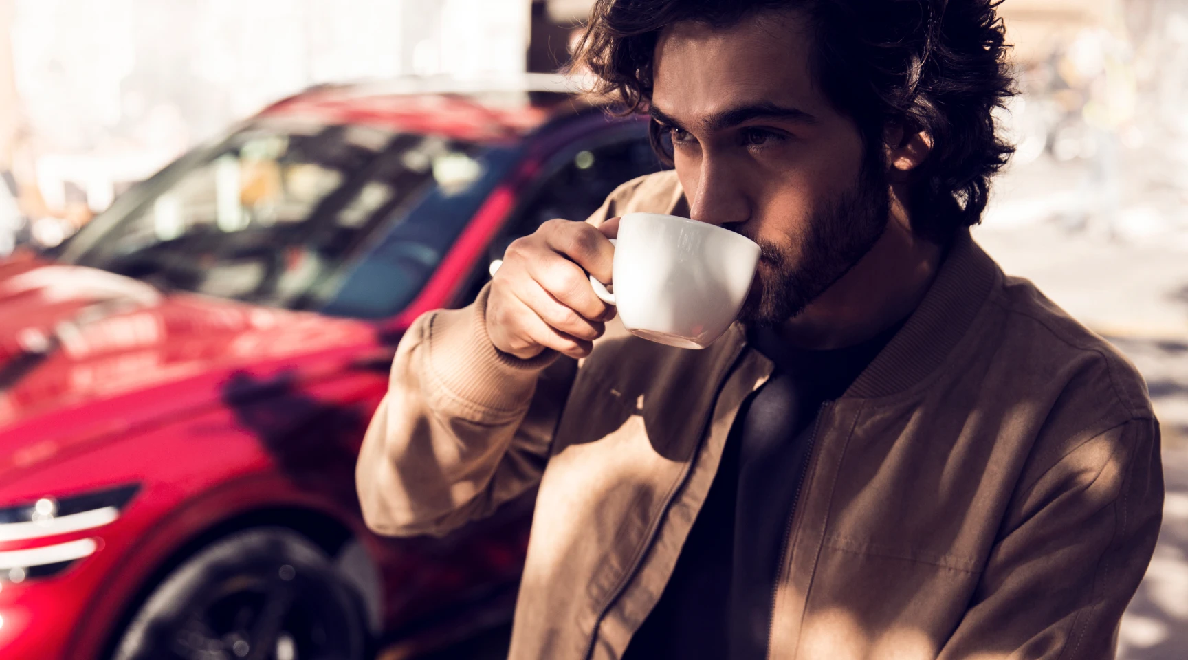 Genesis lifestyle man drinking coffee