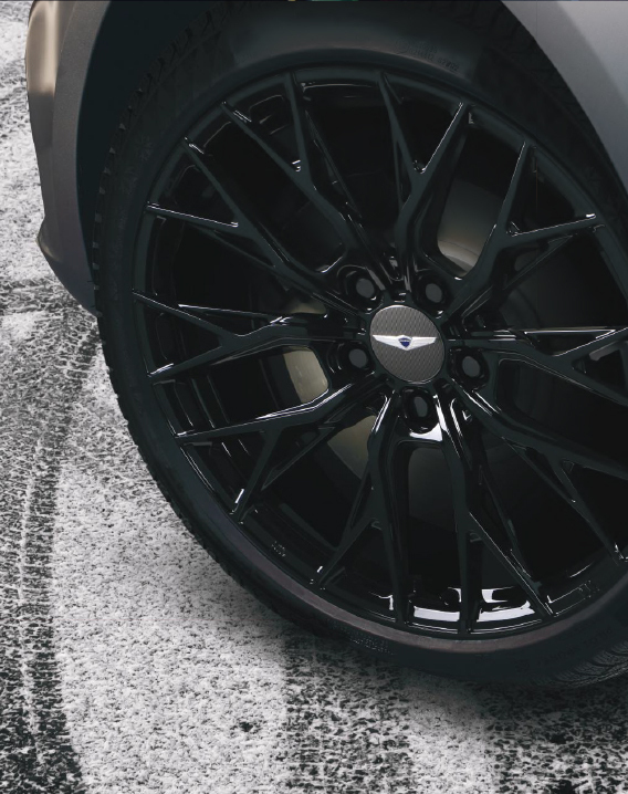 Black Genesis rim and tire