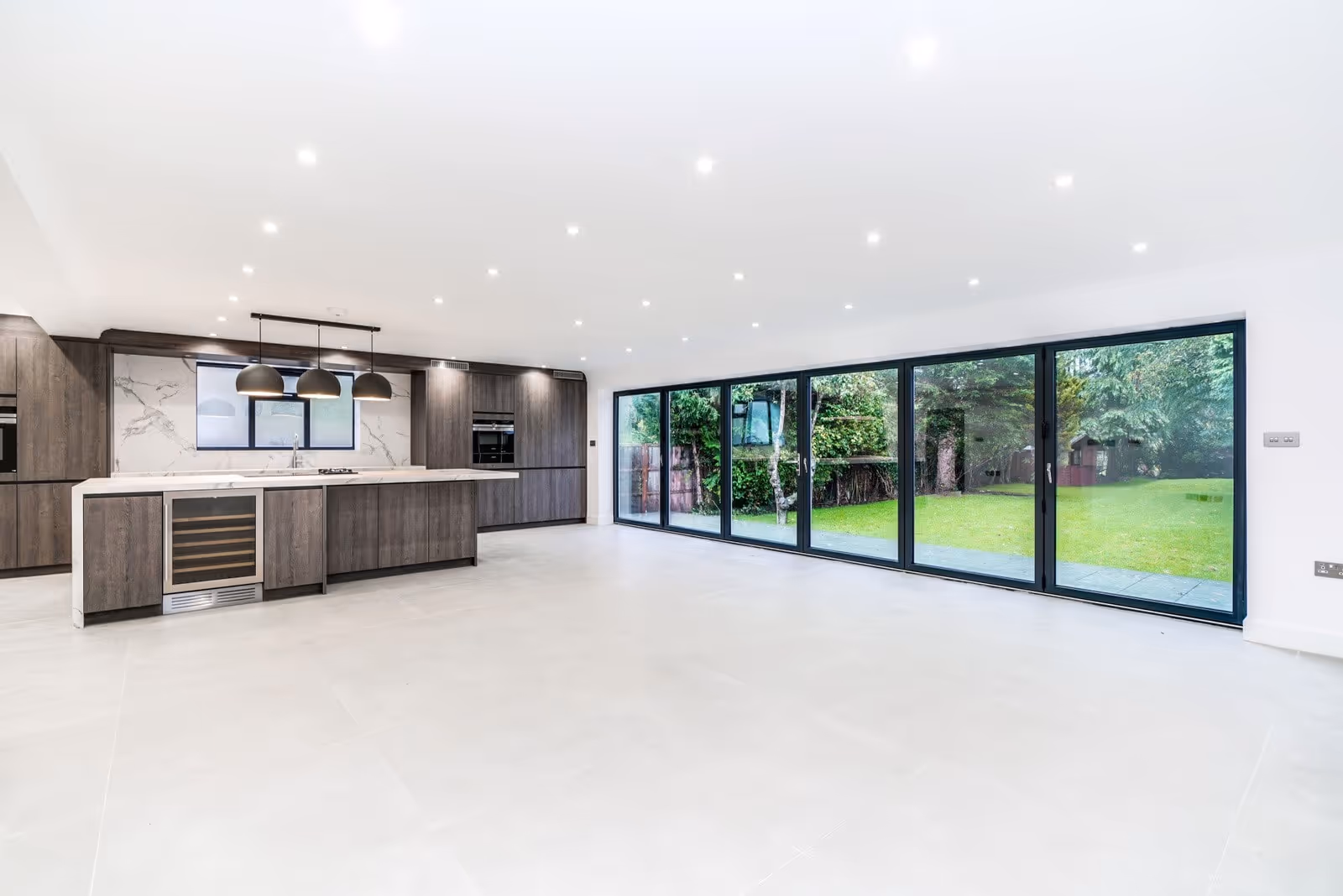 Large kitchen/dining area of a new build house built by Khandys